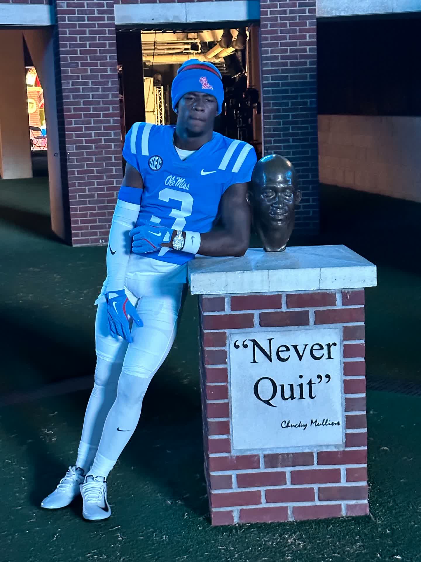Athlete walking through a stadium tunnel